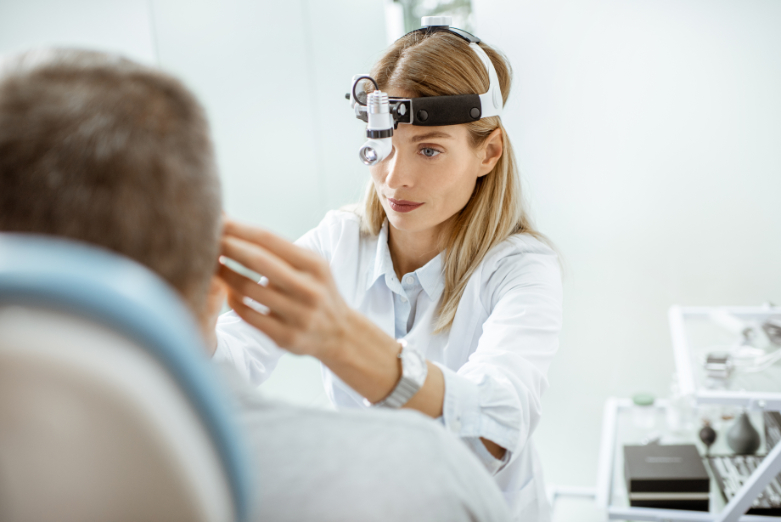 female-otolaryngologist-during-an-examination-proc-2023-11-27-04-57-44-utc (1)